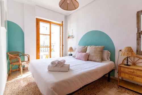 En eller flere senge i et værelse på rentafive - Bungalow - Terraza - Gran Playa