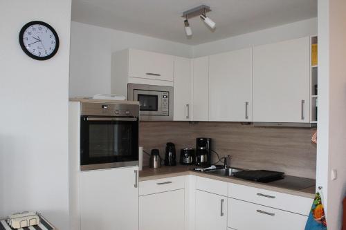Kuchyň nebo kuchyňský kout v ubytování Fewo Kleine Meeresbrise / Villa Christine
