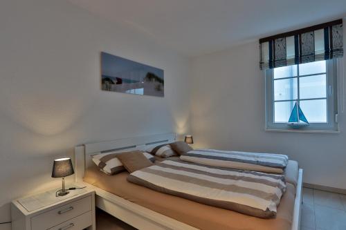 Postel nebo postele na pokoji v ubytování Arielle