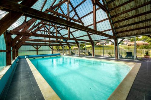 Chalet bois au Lac des Estives