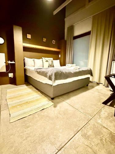 Ένα ή περισσότερα κρεβάτια σε δωμάτιο στο Atlantic-Square Guesthouse