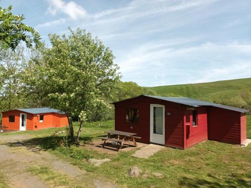 Photo de la galerie de l'établissement Chalet bois au Lac des Estives, à Montgreleix
