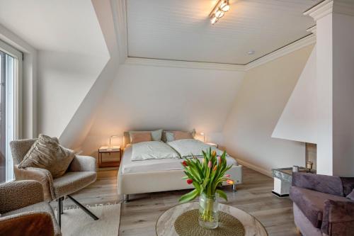 Postel nebo postele na pokoji v ubytování Haus Westsee Og Friesenstil