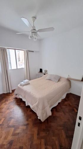 Ένα ή περισσότερα κρεβάτια σε δωμάτιο στο Lindo y confortable departamento con perfecta ubicación
