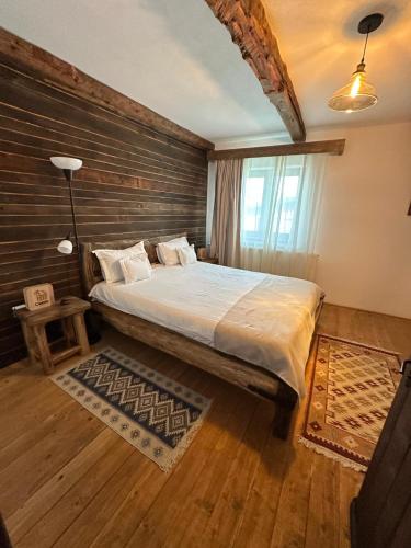 Casa de Oaspeti Caezuにあるベッド