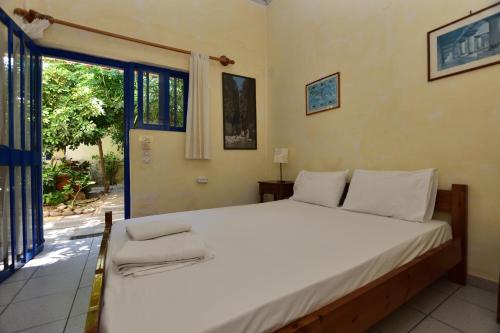 Postel nebo postele na pokoji v ubytování Anonymous Homestay