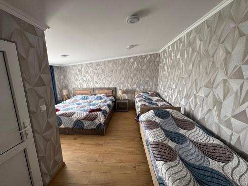 Postel nebo postele na pokoji v ubytování guesthouse gareji