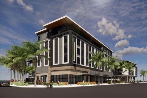 a rendering of a building with palm trees in front at Element Las Vegas Symphony Park in Las Vegas