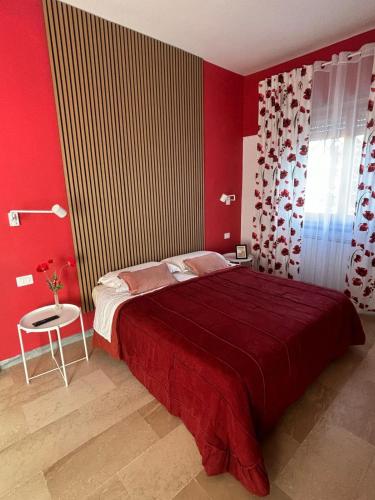 Postel nebo postele na pokoji v ubytování Casa Mammì