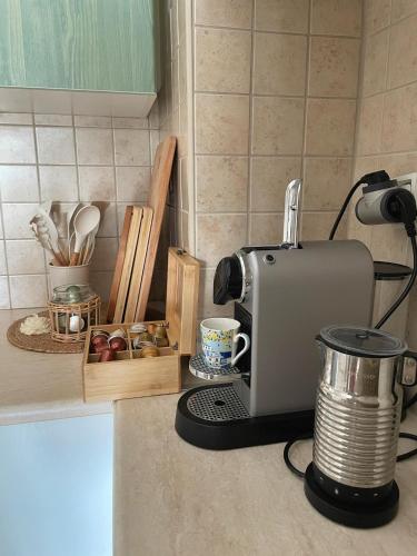a coffee maker on a counter in a kitchen at Pyrgadikia Treasure in Pyrgadikia