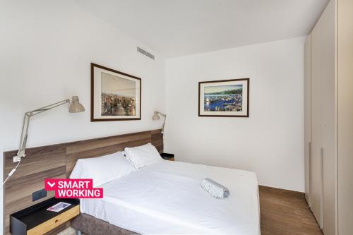 Brignole de Ferrari Refined Home by Wonderful Italy tesisinde bir odada yatak veya yataklar