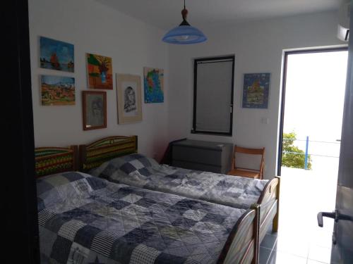 Ένα ή περισσότερα κρεβάτια σε δωμάτιο στο Cottage