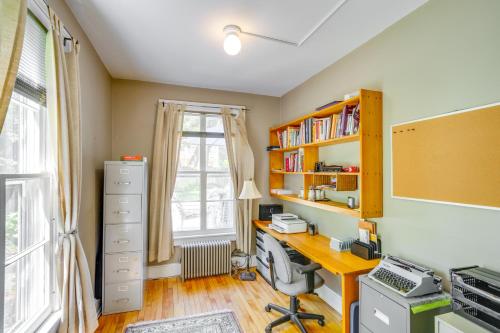 a home office with a desk and a window at Elegant Pittsfield Home Near Downtown and Skiing! in Pittsfield
