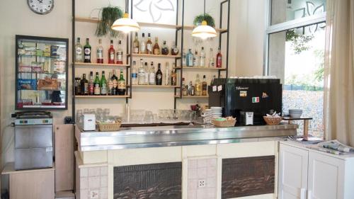 Kuchyň nebo kuchyňský kout v ubytování Hotel Gladys