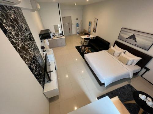 Llit o llits en una habitació de HJD Apartment