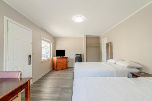 Ένα ή περισσότερα κρεβάτια σε δωμάτιο στο Cypress Inn Motel By OYO West Monroe I-20