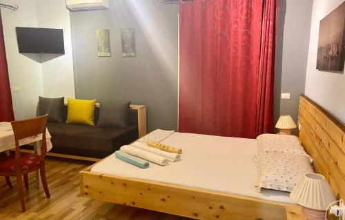 Een TV en/of entertainmentcenter bij Apartments Vista Mar
