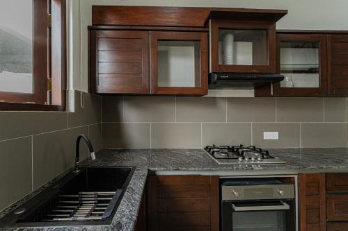 Kuchyň nebo kuchyňský kout v ubytování Sithmi Homes