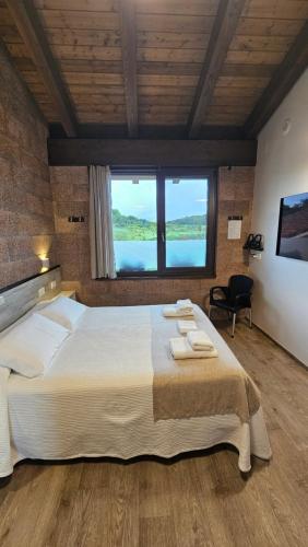 Postel nebo postele na pokoji v ubytování Casa Nahia Hostal Rural