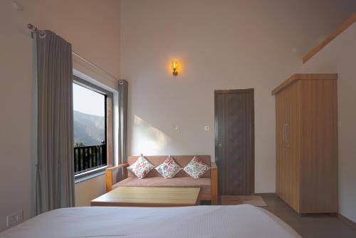 Ένα ή περισσότερα κρεβάτια σε δωμάτιο στο Happy Himalayan Homes