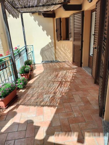 a patio with a shadow of a building at Casa Giuliana in Pula