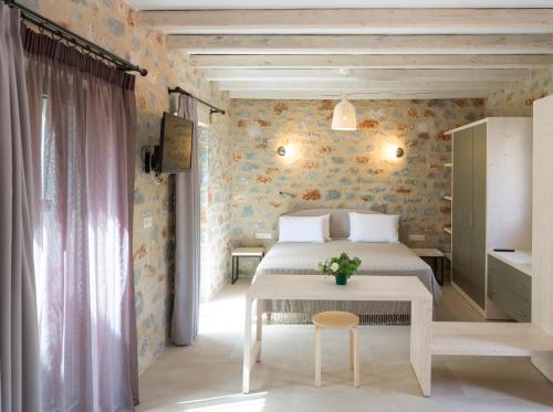 Postel nebo postele na pokoji v ubytování Mythies - Holiday Houses in Mani
