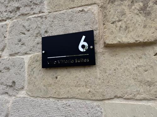 Certifikát, hodnocení, plakát nebo jiný dokument vystavený v ubytování Villa Vittoria Suites