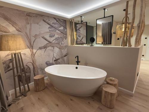 Koupelna v ubytování Das Oswald's Boutique Hotel