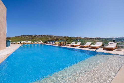 Bazén v ubytování Reef Hotel & Spa nebo v jeho okolí