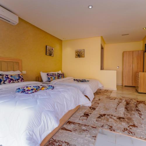 Postel nebo postele na pokoji v ubytování Hotel Jnane riad