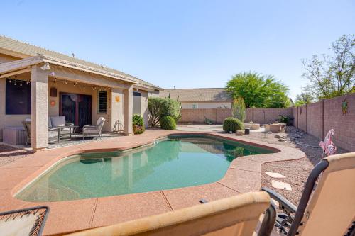 a swimming pool in the backyard of a house at Avondale Getaway Less Than 8 Mi to Estrella Mountain! in Avondale