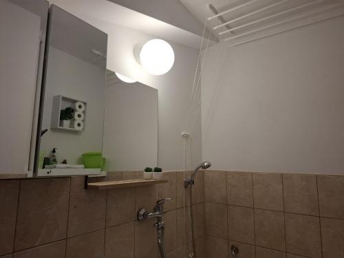 Koupelna v ubytování Apartament u Zegarmistrza z garażem