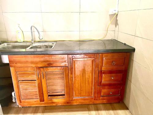 a kitchen with a sink and a counter top at Lee's House in Dong Anh