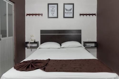 Postel nebo postele na pokoji v ubytování Hotel BAWER