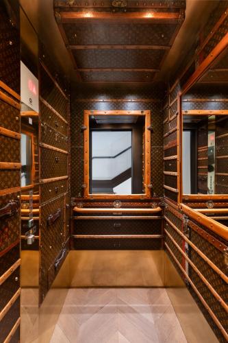 a wine cellar with a window in a room at Hotel Boutique Casa del Limonero in Seville