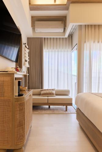 Letto o letti in una camera di PE-LA Thapae Boutique Hotel