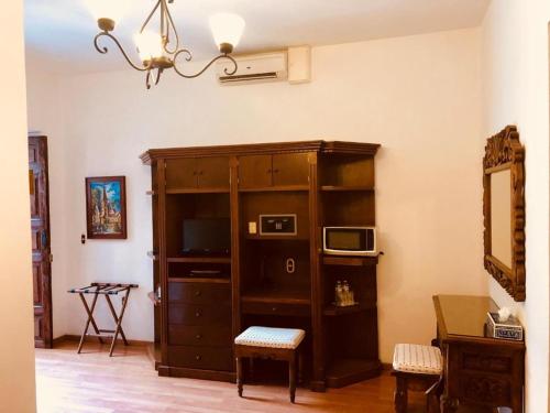 Kuchyň nebo kuchyňský kout v ubytování HOTEL MI SOLAR EJECUTIVO