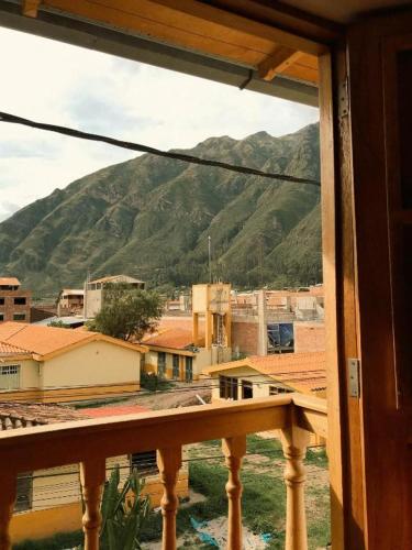 a view of a mountain from a balcony at Nafis Casona Apu Linli Pisac in Pisac