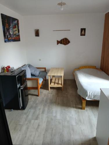 Postel nebo postele na pokoji v ubytování Cophi home Penguily