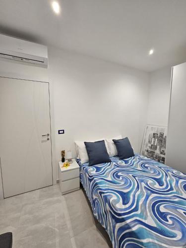 Postel nebo postele na pokoji v ubytování Appartamento in centro a 250m stazione di principe