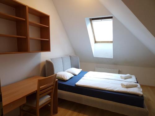 Postel nebo postele na pokoji v ubytování Glinška rooms