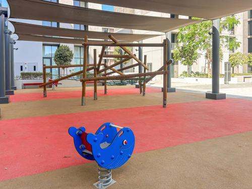 a blue balloon is sitting on a playground at Silhouette Suite Studio by JK in Sharjah