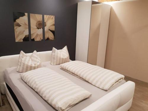 Ένα ή περισσότερα κρεβάτια σε δωμάτιο στο Feriendomicil am Warener Hafen Casita Priscila