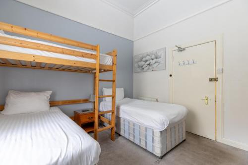 Ένα ή περισσότερα κρεβάτια σε δωμάτιο στο The Bein Inn Hotel & Restaurant