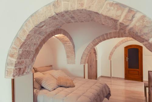 Area soggiorno di Widespread Trulli in the historic center - Trulli Antichi Mestieri