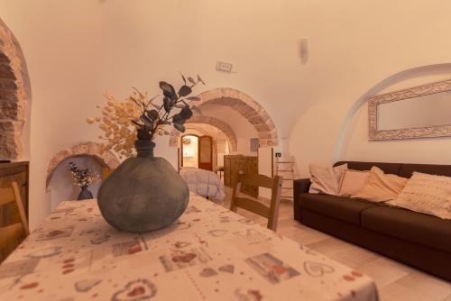 Letto o letti in una camera di Widespread Trulli in the historic center - Trulli Antichi Mestieri