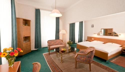 Postel nebo postele na pokoji v ubytování Hotel Alte Post