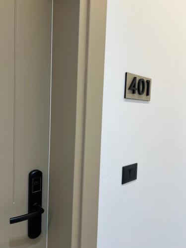 a door with the number on it at Skanderbeg Hotel in Krujë