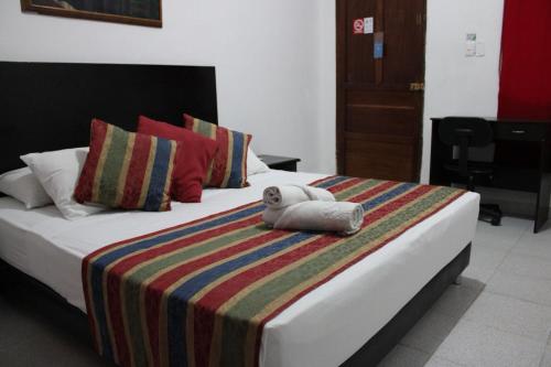 Uma cama ou camas num quarto em Park Hotel