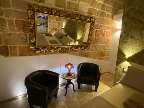 Et opholdsområde på Suite maXimo con vasca Idromassaggio